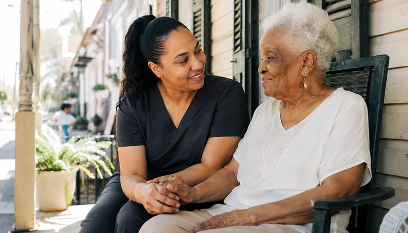 An in-home senior caretaker with an elderly female at her home in New Orleans.